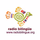 Radio Bilingüe - KVMG Logo